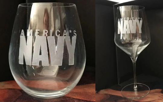 Two wine glasses with "America's Navy" engraving.